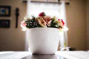 pexels-photo-2087743-2087743 A beautiful floral bouquet in a white vase, elegantly displayed in a sunlit room, creating a serene ambiance.